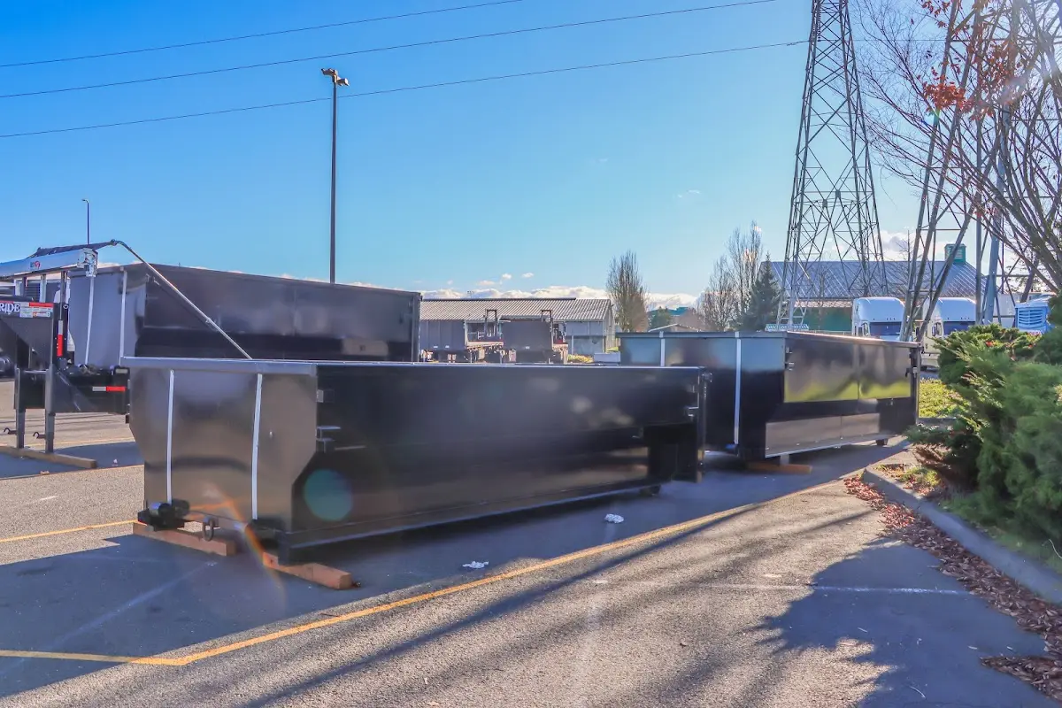 Roll-off dumpster ready for waste disposal at job site for Residential Dumpster Rental in Charlestown